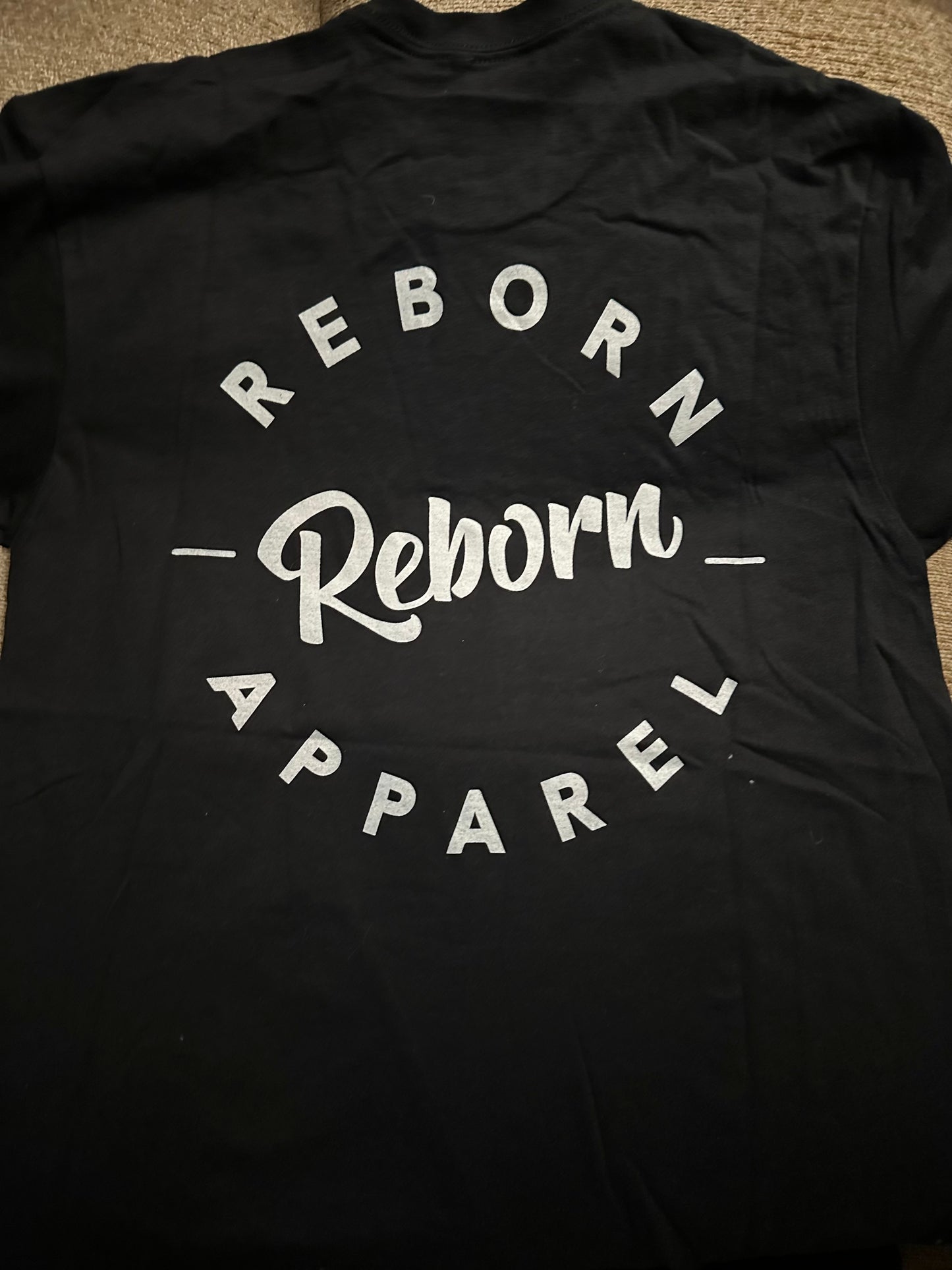 Reborn Apparel Black T-shirt with white writing